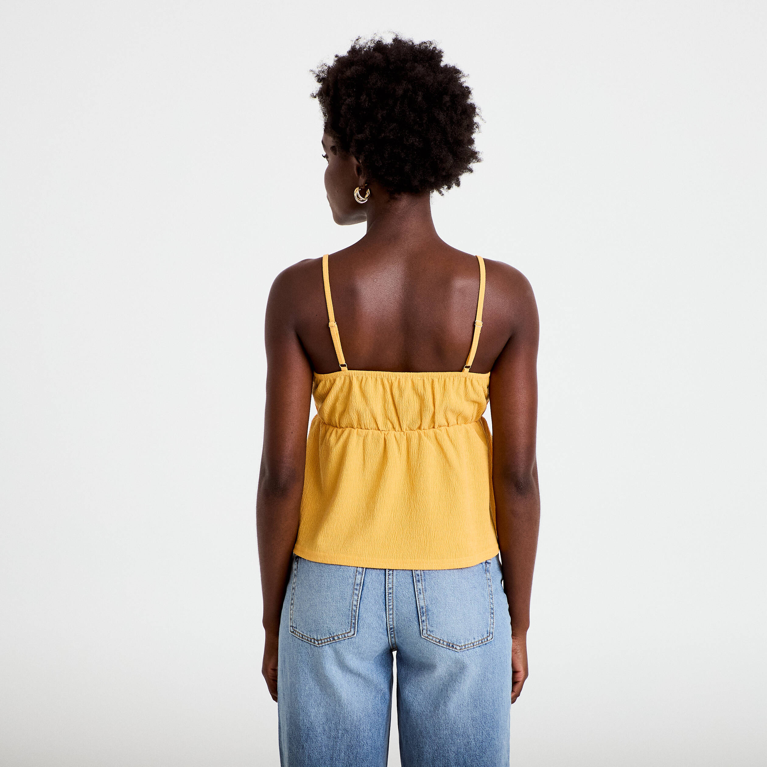 D&eacute;bardeur d&eacute;tail bijou orange clair femme
