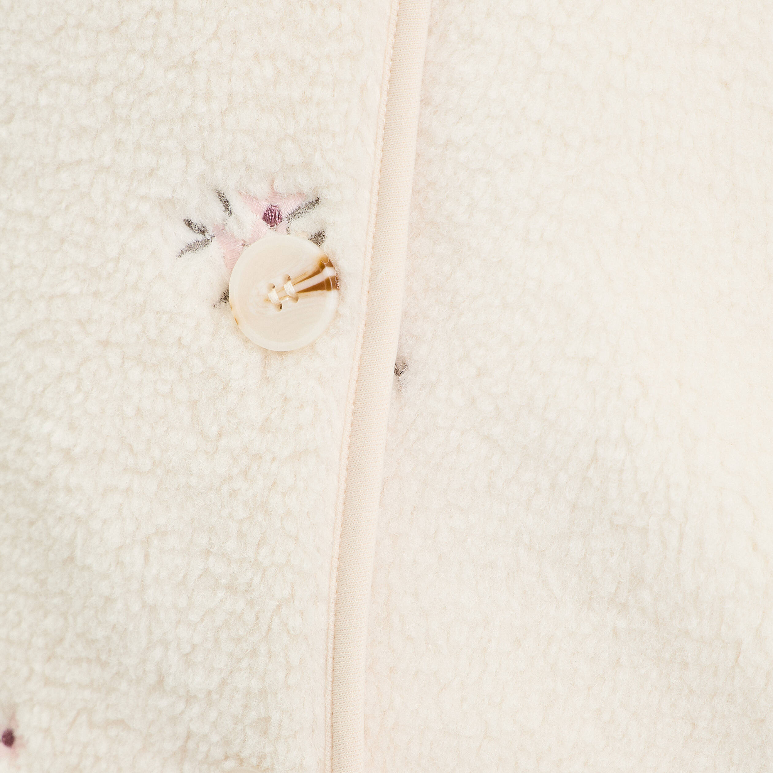 Gilet sans manches brod&eacute; effet polaire blanc femme